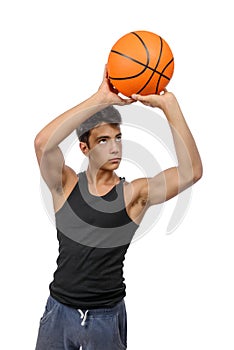 Teen sportsman with sportswear playing basketball. White background.