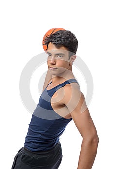 Teen sportsman with sportswear playing basketball. White background.