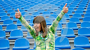 Teen at the stadium with okay