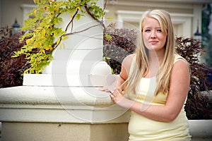 Teen Standing next to Pillar