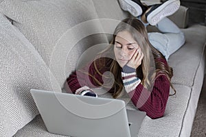 Teen student doing online school work from home