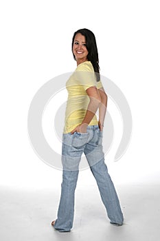 Teen turning with hands on hips