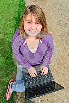 Teen Using Laptop