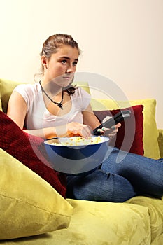 Teen watching television photo