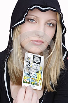 Teen witch with tarot card