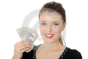 Teen woman with dollars.