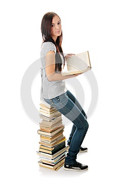 Teen woman reading book