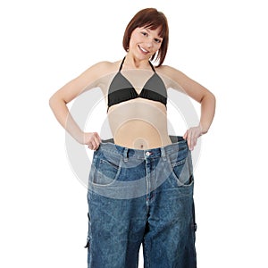Teen woman showing how much weight she lost