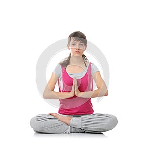 Teen woman training yoga