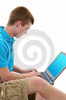 Teen Working On Laptop Computer