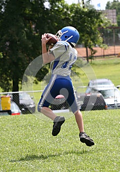 Teen Youth Football Catching Ball