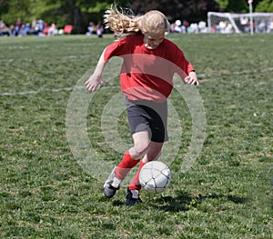 Teen Youth Soccer Player Kicking Ball (2)