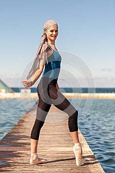 Teenage Ballerina at outdoor shoot at ocean baths in Newcastle - portrait format