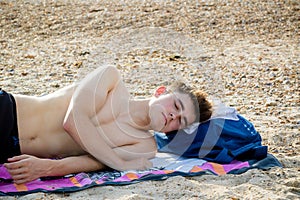 Teenage boy at the beach