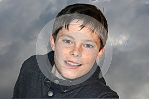 Teenage boy in black hoodie