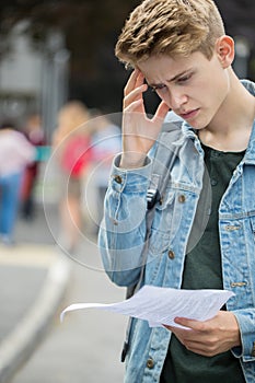 Teenage Boy Disappointed With Exam Results