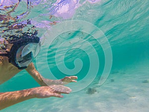 Teenage boy does snorkeling