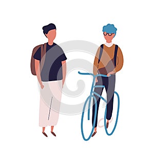 Teenage boy dressed in school uniform meeting his friend on bicycle or bike. Pair of students, pupils, classmates or