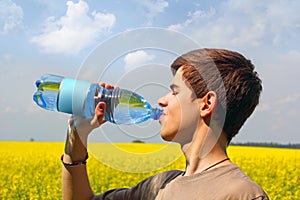 Teenage Boy Drinking Water