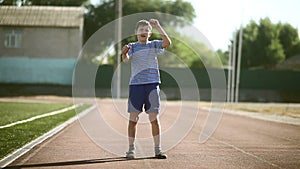 Teenage boy engaged sport stadium stretching