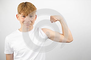 Teenage Boy Flexing His Bicep