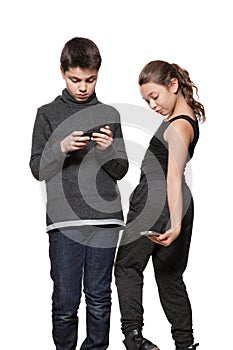 Teenage boy and girl with their smart phone