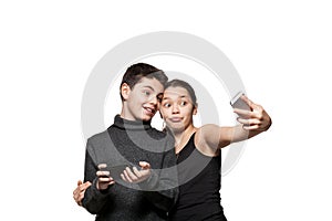 Teenage boy and girl with their smart phone