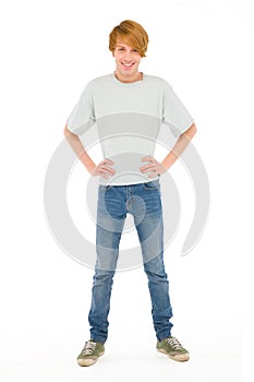 Teenage boy with hands on hips