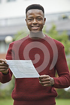 Teenage Boy Happy With Good Exam Results