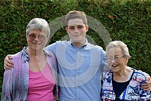 Teenage boy and his grandmothers