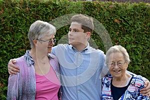 Teenage boy and his grandmothers