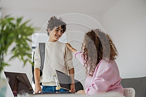 Teenage boy with his mother at home