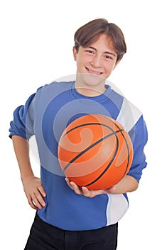 Teenage boy holding a basketball