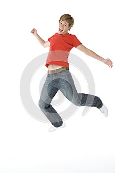 Teenage Boy Jumping In The Air