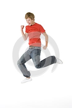 Teenage Boy Jumping In The Air