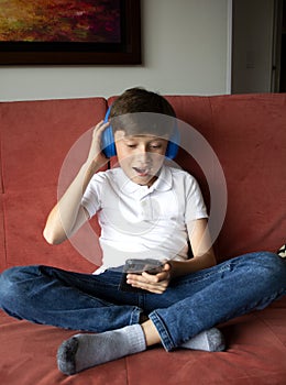 Teenage Boy Listens To Music