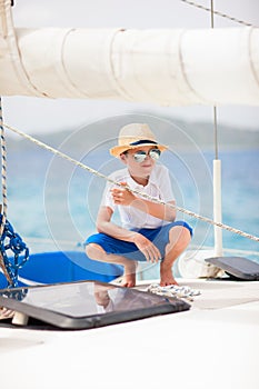 Teenage boy at luxury yacht