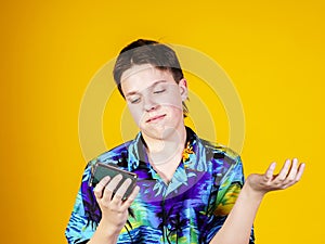 Teenage boy with opera binocular close-up portrait photo