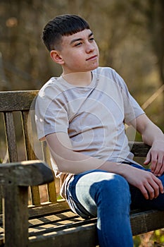 Teenage boy outside on a bright Spring day