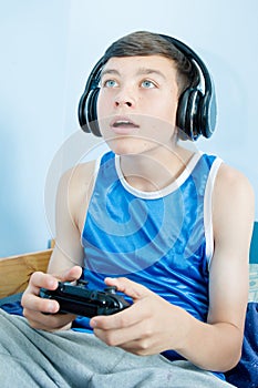 Teenage boy playing a video game