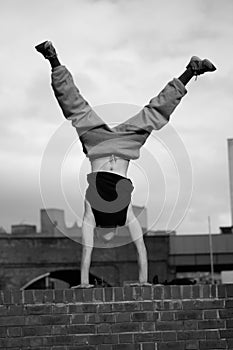 Teenage boy practicing free running photo