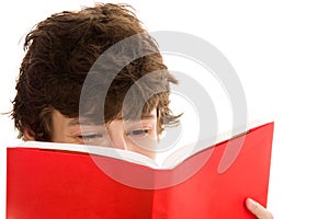 Teenage boy reading book