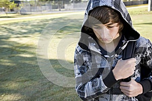 Teenage boy with school backpack photo