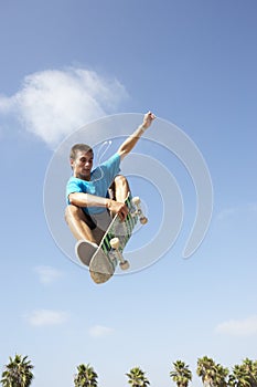 Teenage Boy In Skateboard Park