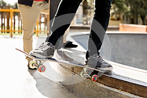 Teenage boy skateboarding outdoors