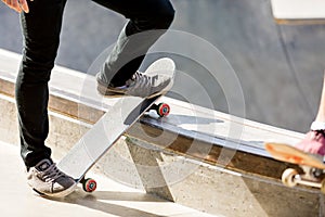 Teenage boy skateboarding outdoors