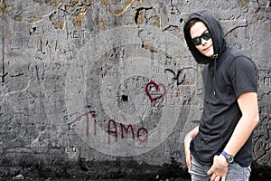 Ti amo graffiti and boy with black hoodie photo