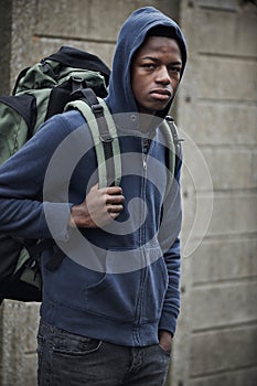 Teenage Boy On The Streets With Rucksack