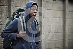 Teenage Boy On The Streets With Rucksack photo