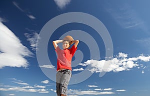 Teenage boy throwing football